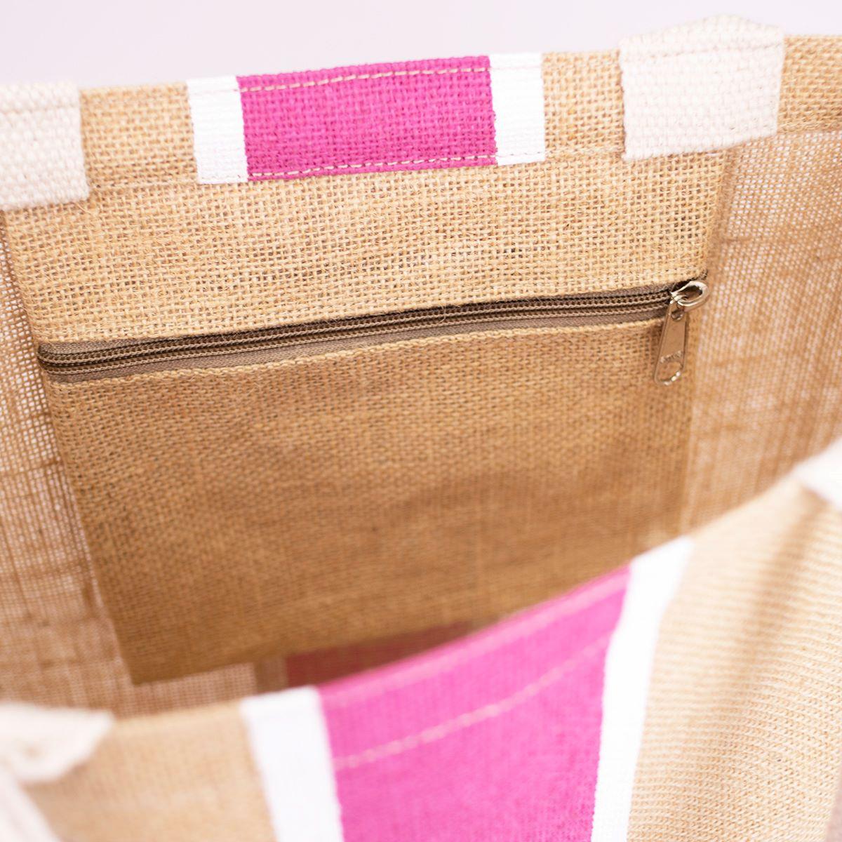 Inside of the jute tote showing a zippered pocket