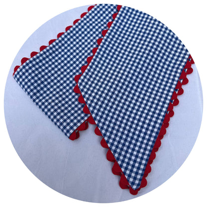 Royal blue gingham wreath sash with red ric rac trim on the edges
