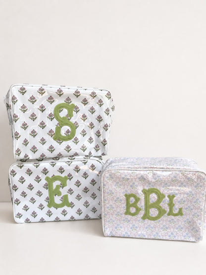 Pink and white striped cosmetic case