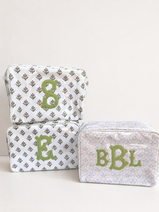 Pink and white striped cosmetic case