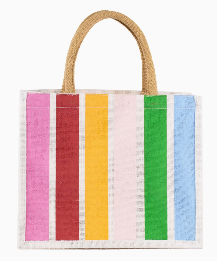Striped gift tote in white and multicolour stripes with matching handles.