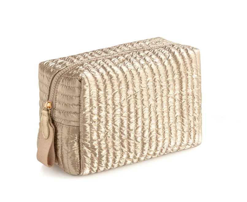 Gold metallic quilted zipper pouch with a tan zip pull