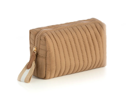 Brown quilted zipper pouch with vertical channels and a striped fabric zip pull
