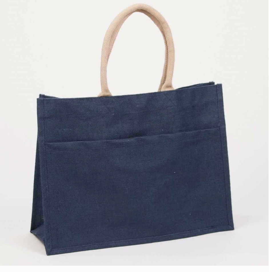 Navy jute tote with a front pocket and tan rope handles