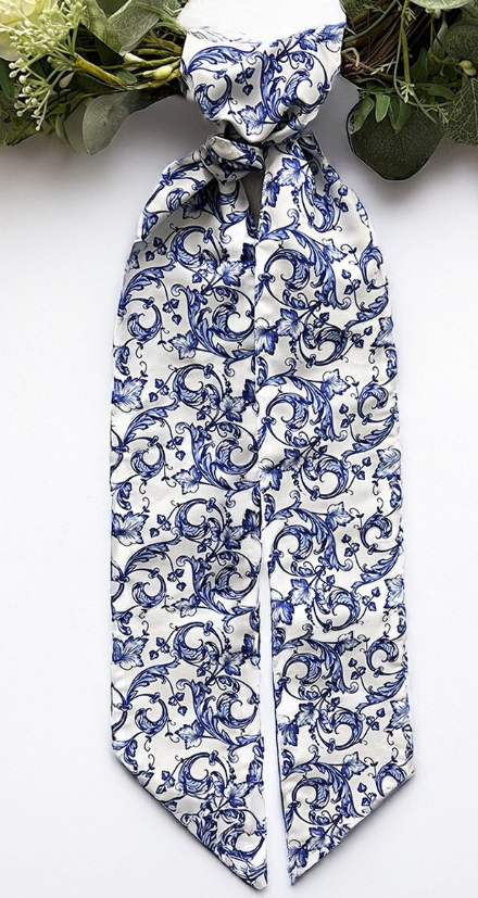 Patterned wreath sash in a blue and white scroll pattern